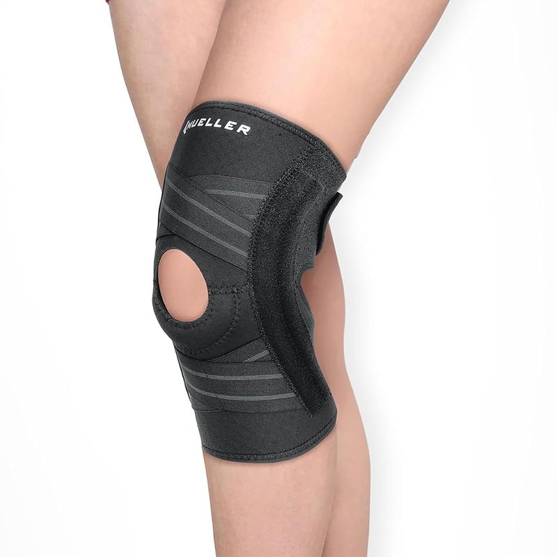 Mueller Self Adjusting Knee Stabilizer | One Size Fits Most |  Adjustable Knee Brace Support with Steel Springs & Patella Buttress, Black - Image 1