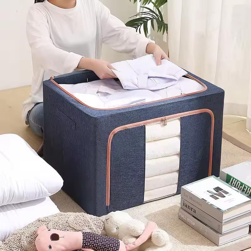هاكو حقيبة تنظيم الملابس القابلة للطي من سعة 66 لتر مع إطار فولاذي وأكياس تخزين من قماش أكسفورد وصناديق تغطية للمعيشة لأرفف خزانة المل��بس، الساري، ملاءة السرير، البطانية (أزرق، 66 لتر - عبوة من 2) - Image 1
