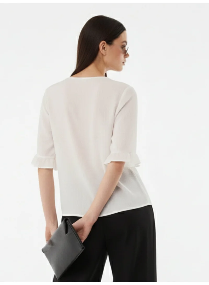 Outzidr  White Front Buttoned Top With Ruffle Detail On Sleeve for Women | Best Price UAE
