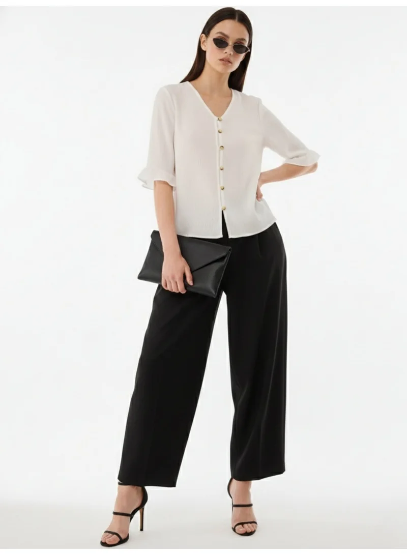 Outzidr  White Front Buttoned Top With Ruffle Detail On Sleeve for Women | Best Price UAE