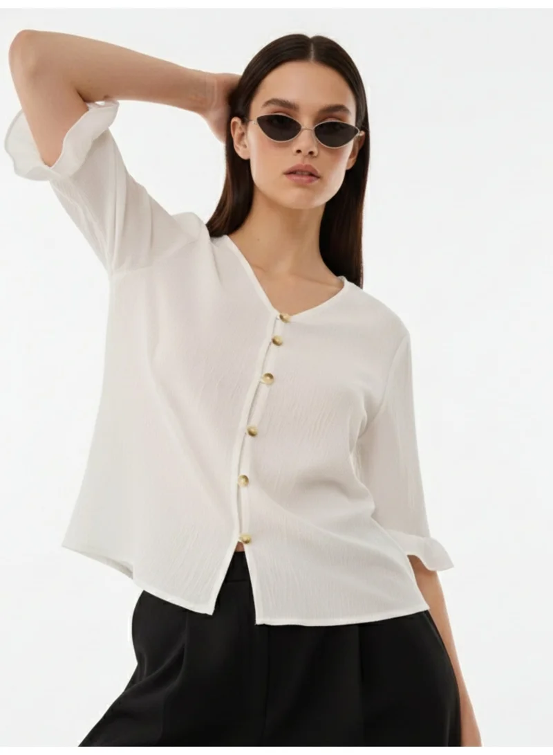 Outzidr  White Front Buttoned Top With Ruffle Detail On Sleeve for Women | Best Price UAE