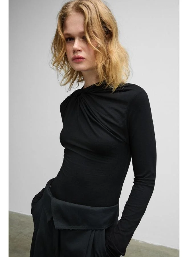 Grimelange HAZE Women's Round Neck Front Knot Detailed Long Sleeve Stretch Fabric Snap Black Blouse.
