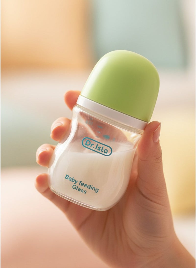 Dr.isla زجاجة رضاعة للأطفال حديثي الولادة من Dr.isla – مضادة للاختناق، زجاج بورا سيليكات، مضادة للمغص، خالية من الـ BPA، سعة 160 مل، من عمر شهر حتى 3 أشهر، لون أخضر - Image 1