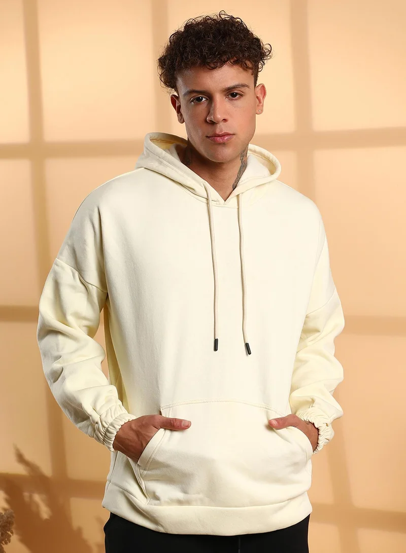 Campus Sutra Men's Light Yellow Oversized Pullover Sweatshirt With Kangaroo Pocket For Casual Wear | Long Sleeve | Pull On Closure | Cotton Sweatshirt Crafted With Comfort Fit For Everyday Wear