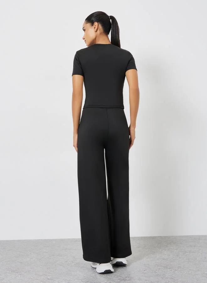 Styli Active  Solid Crop Top and Drawstring Loose Pants Set for Women | Best Price UAE