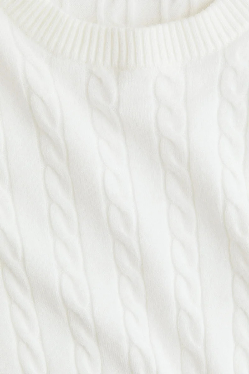 اتش اند ام بلوزة قصيرة محبوكة بنمط الحبال