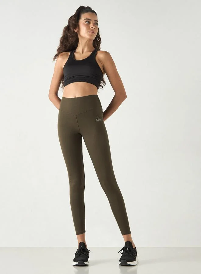 كابا بنطلون ليقنز بخصر مطّاطي وطبعات شعار من كابا