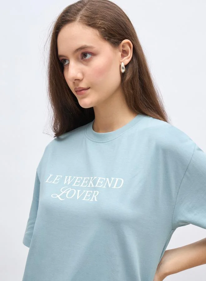 Styli Women Blue Slogan Print Oversized T-Shirt