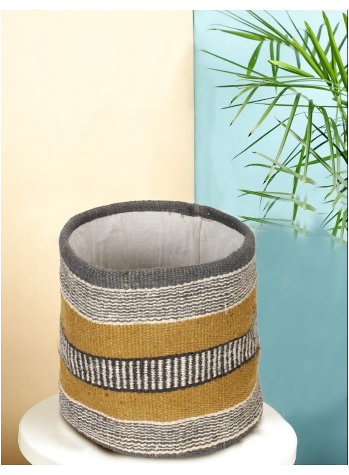 Generic A woven basket with a lining, in black/mustard, made of fabric, featuring a traditional heritage design and attractive colors. It's used to organize and store items in an organized and stylish manner. Dimensions: 20 cm high, 20 cm diameter.  - Image 1