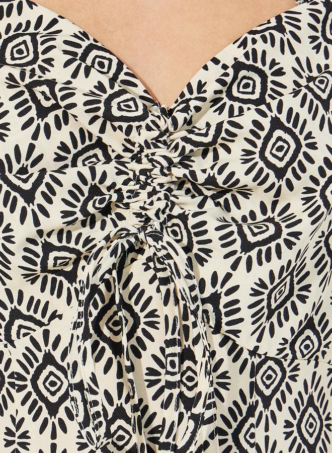 ستايلي فستان ميدي مطبع بالكامل مع تفاصيل مزمومة - Image 3