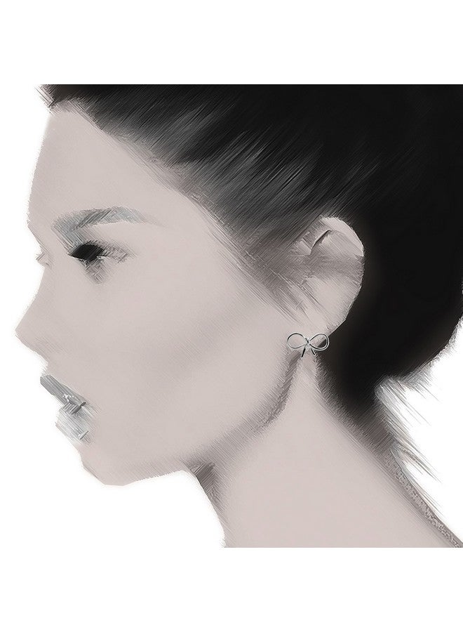 SpinningDaisy Handmade High Gloss Tiny Bow Earrings Silver - Image 4