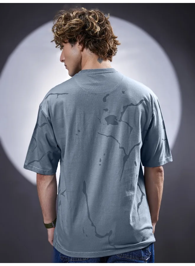 مانياك تيشيرت قطن رجالي رمادي فاتح برقبة مستديرة وأكمام نصفية بطبعة مانياك