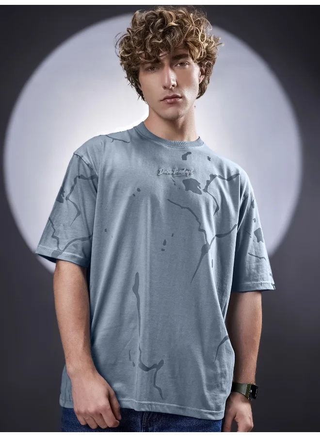 مانياك تيشيرت قطن رجالي رمادي فاتح برقبة مستديرة وأكمام نصفية بطبعة مانياك