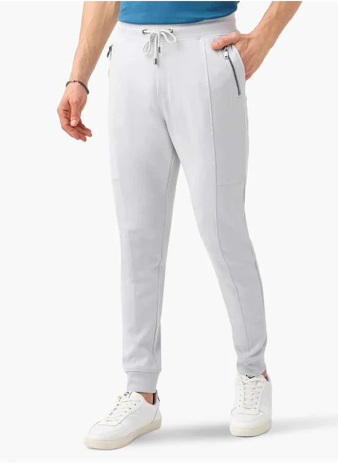 ايكونيك Iconic Panelled Slim Fit Joggers with Drawstring Closure and Pockets