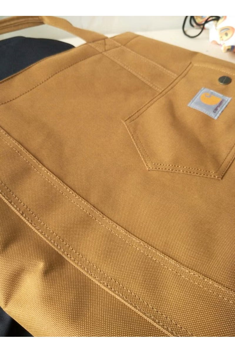 كارهارت حقيبة **كارهارت** الكبيرة المفتوحة مع جيب كبير - حقيبة كتف فردية / حقيبة صدرية - Image 3