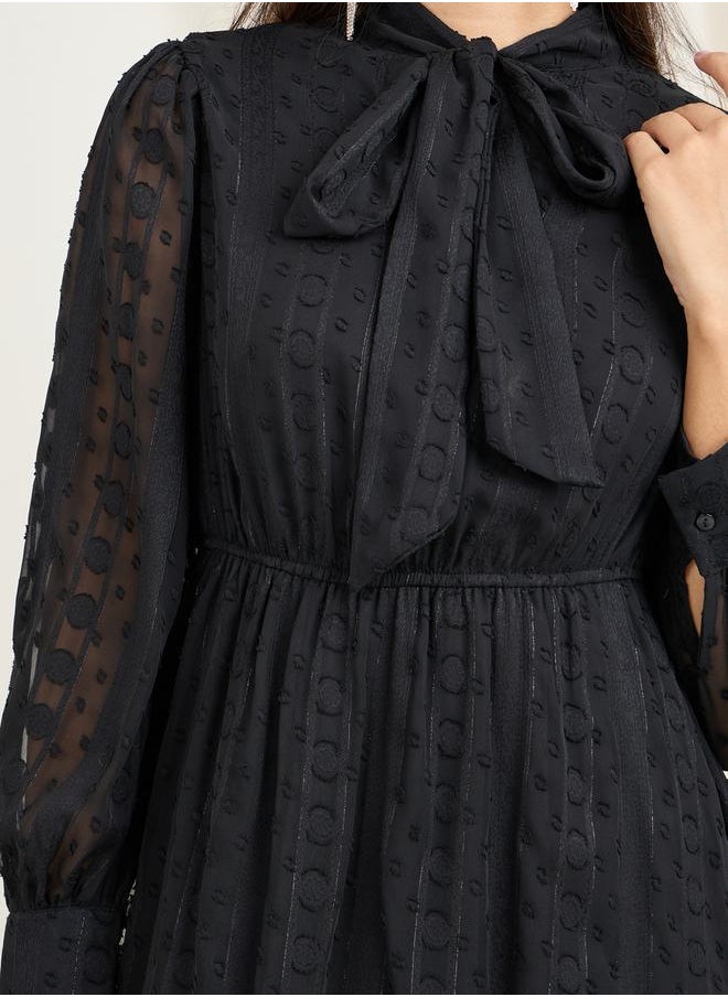 Styli - Dobby Textured Tie Up Neck A-Line Maxi Dress - Image 1