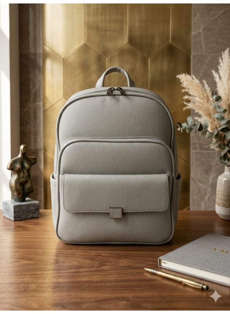 SUNSTAR leather backpack with pebbled texture and embossed grid panel. - Image 1