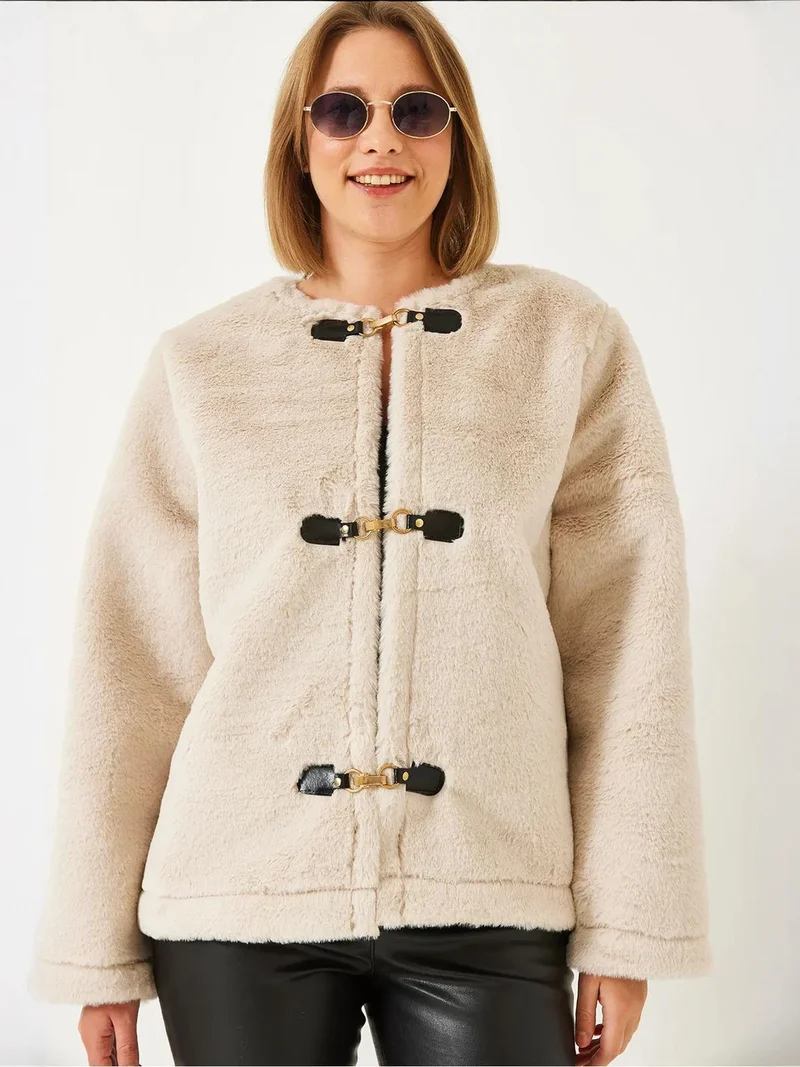 بيانكو لوتشي معطف طويل بأكمام من الجلد الصناعي المزخرف من لوتشي