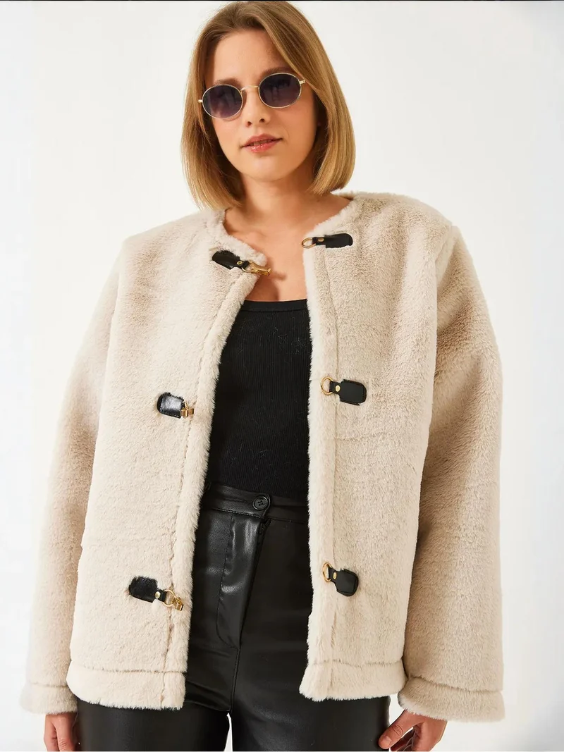 بيانكو لوتشي معطف طويل بأكمام من الجلد الصناعي المزخرف من لوتشي