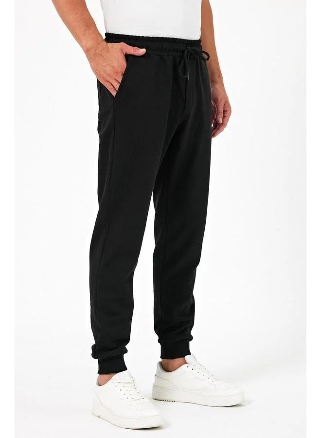 Mmetalic  Thick Black Men's Jogger Sweatpants with Back Pocket, Elastic Cuffs, Regular Fit, No Fleece Lining for Men | Best Price UAE