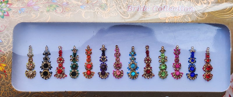 ATCUSA جواهر الوجه العروس كريستال ملون بindi تيكا جبهة هندية بindi للنساء بindi هندية ملونة دائرية طويلة صغيرة ذهبية (بindi طويلة - 12 بindi) - Image 1