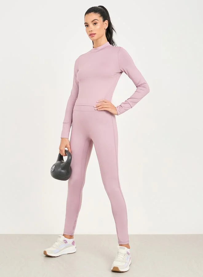 Styli High Neck Multi Panel Keyhole Back Long Sleeve Crop Top & Legging Set
