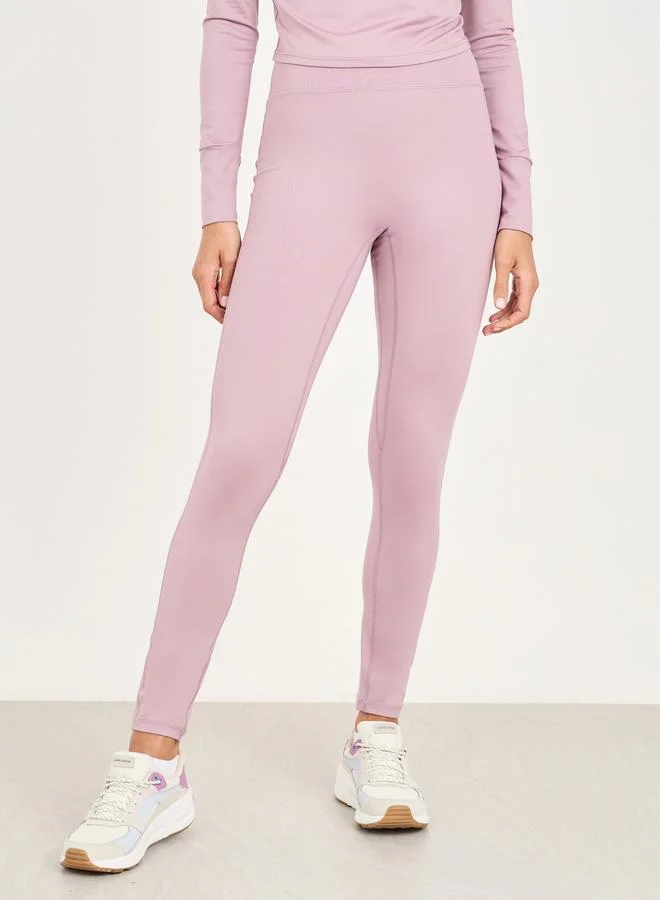 Styli High Neck Multi Panel Keyhole Back Long Sleeve Crop Top & Legging Set