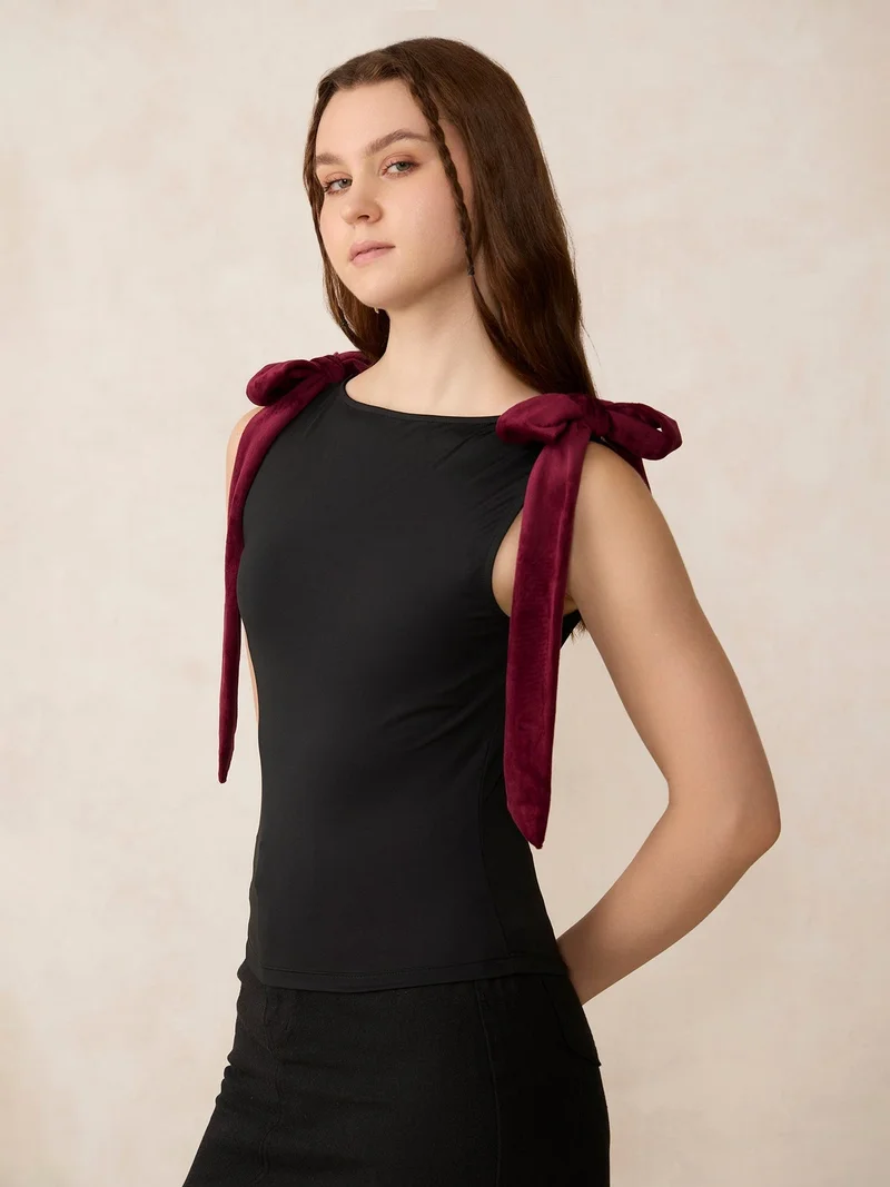 Outzidr  Black Velvet Bow Detail Knit Top for Women | Best Price UAE