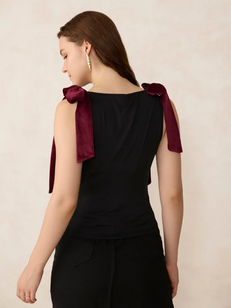 Outzidr  Black Velvet Bow Detail Knit Top for Women | Best Price UAE