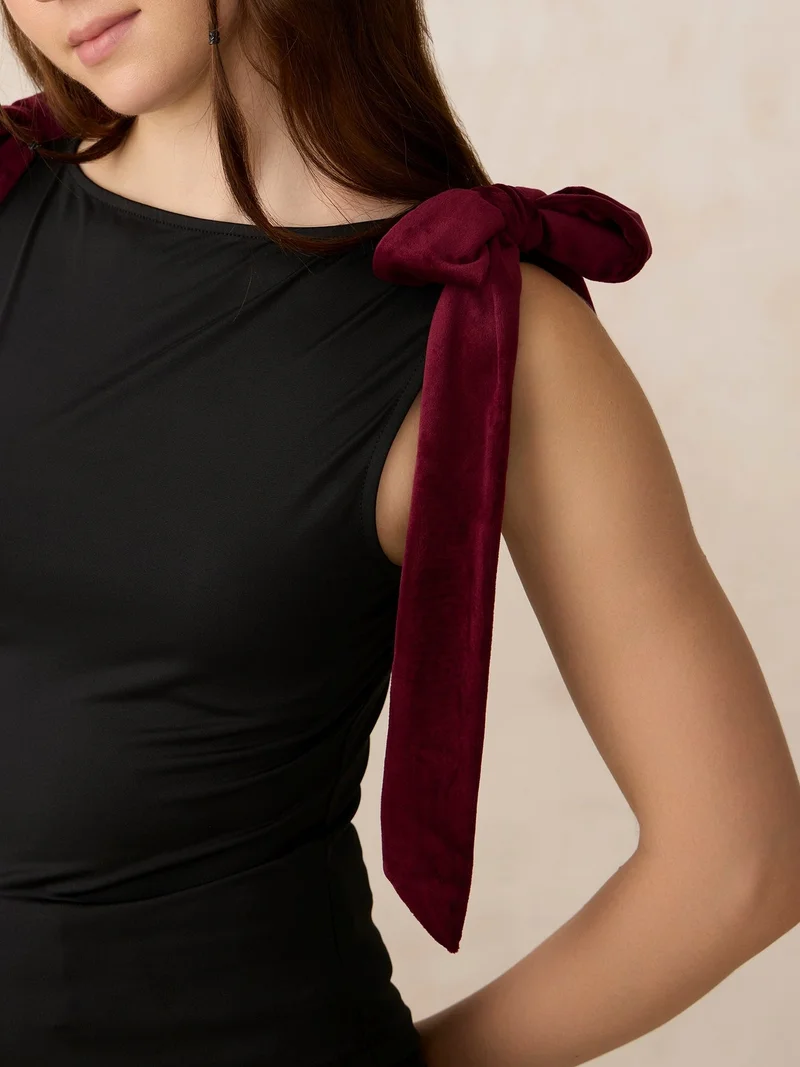 Outzidr  Black Velvet Bow Detail Knit Top for Women | Best Price UAE