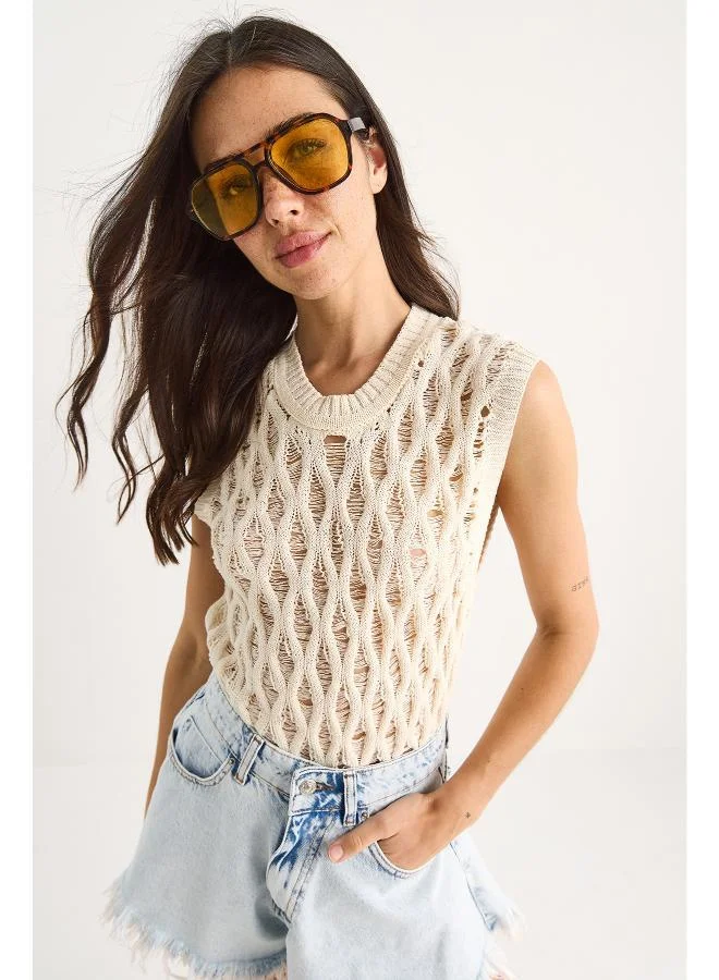 جينجر بلوزة كروشيه محبوكة