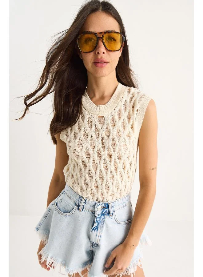 جينجر بلوزة كروشيه محبوكة