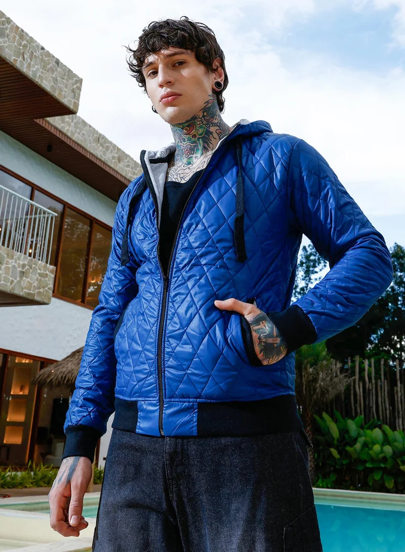 Campus Sutra Men's Zip-Front Quilted Jacket | Hooded Neck , Long Ribbed Cuff Sleeves , Zipper Closure , Straight Hem | Solid Woven Quilted For Casual & Daily | Indigo Blue