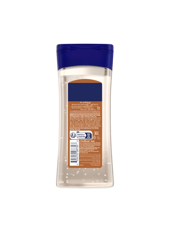 فازلين زيت الجسم المنشط والمشرق بخلاصة الكاكاو للعناية المركزة، غني بزبدة الكاكاو النقية 100% وزيوت مغذية لإشراقة تدوم طويلاً | جل زيتي غير دهني للجسم لبشرة صحية ومتألقة | 200 مل - Image 1