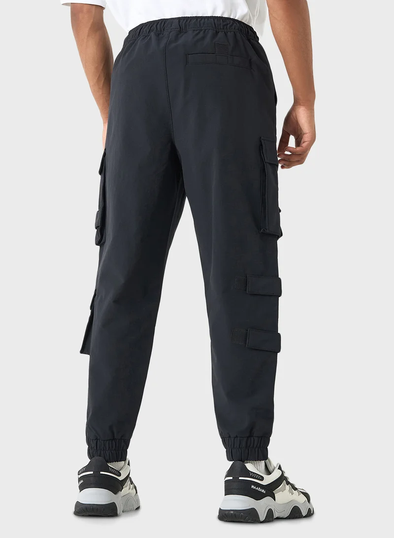 SP Characters Logo Embossed Relaxed Fit Pants