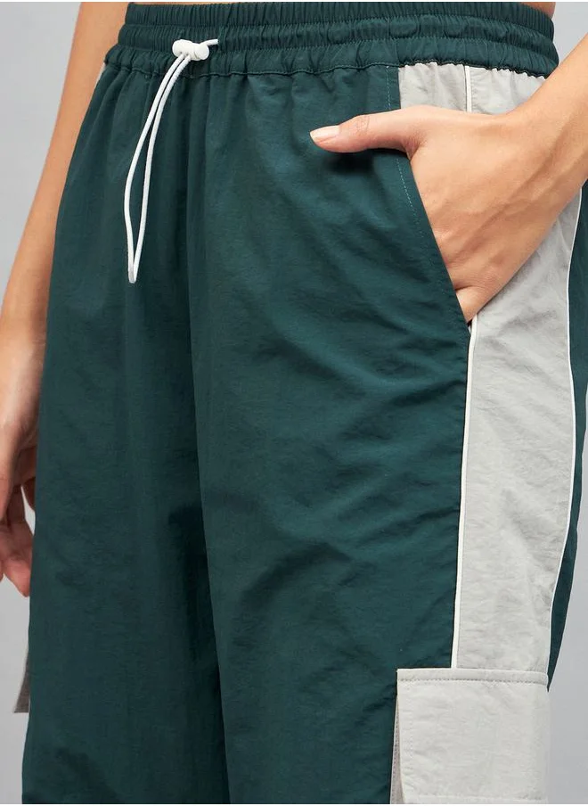 SASSAFRAS Colorblock Cargo Parachute Pants by Styli