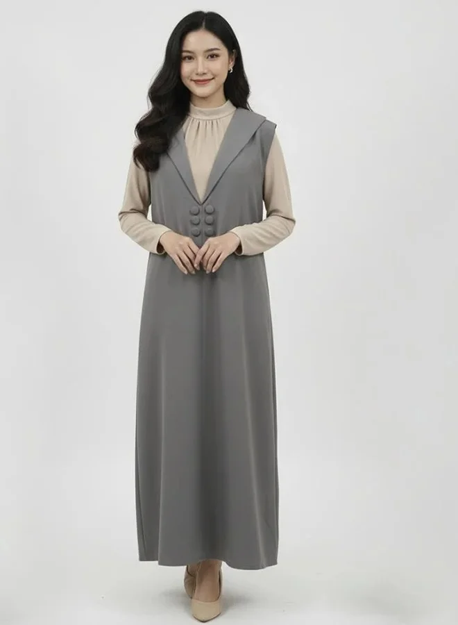lamha abaya Practical abaya with a blazer-style cut, paired with a separate dress, adorned with light gray buttons