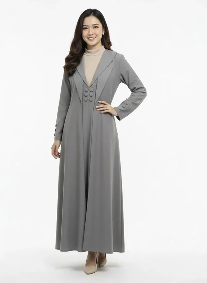 lamha abaya Practical abaya with a blazer-style cut, paired with a separate dress, adorned with light gray buttons