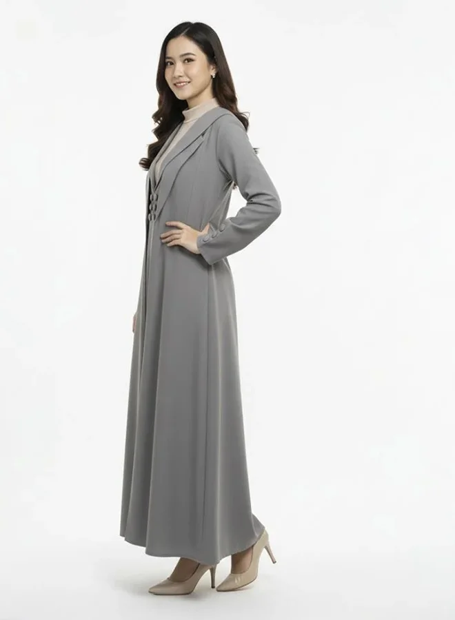 lamha abaya Practical abaya with a blazer-style cut, paired with a separate dress, adorned with light gray buttons