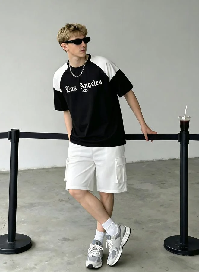 تايك تو مجموعة من تيشيرت بأكمام راجلان وشورت بنمط كتل الالوان للرجال