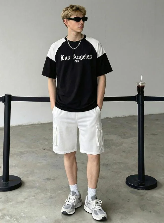 تايك تو مجموعة من تيشيرت بأكمام راجلان وشورت بنمط كتل الالوان للرجال