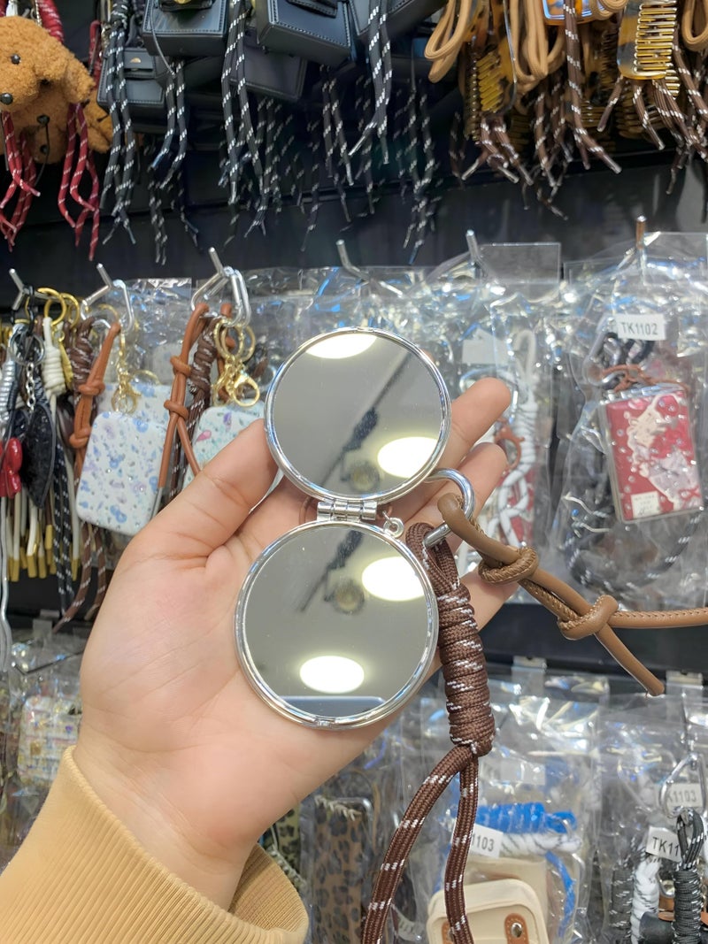 Leather - Stylish handheld mirror with ultra-clear glass surrounded by durable artificial leather frame and a snap closure guard ensuring long-lasting pristine condition. (option 3) - Image 2