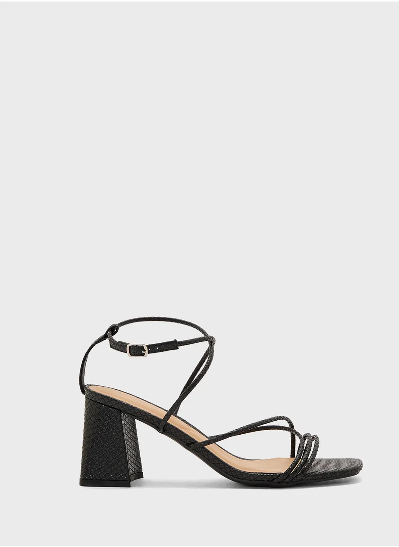 ترافل من نمشي Flaire Block Heel Multi Strap Ankle Strap Block Heel Sandal