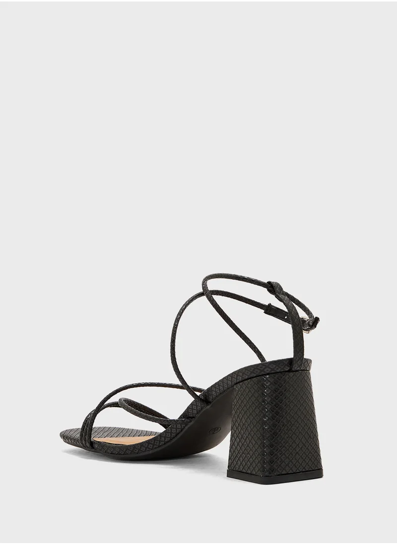 ترافل من نمشي Flaire Block Heel Multi Strap Ankle Strap Block Heel Sandal