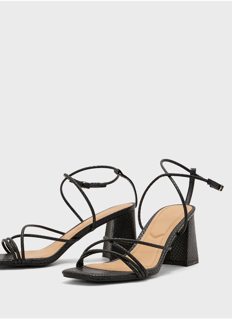 ترافل من نمشي Flaire Block Heel Multi Strap Ankle Strap Block Heel Sandal