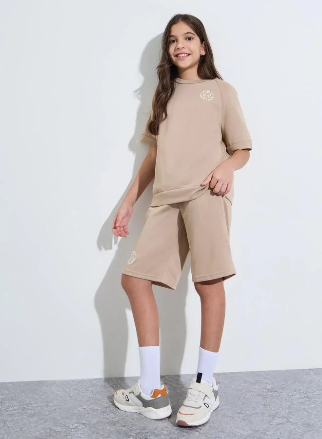 Styli Teen Girls Beige Raglan Sleeves Oversized T-Shirt and Shorts Set