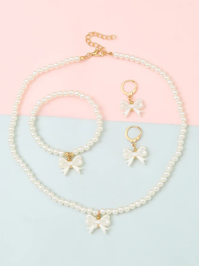 تايك تو Take Two Set of 3 - Bow Pendant Faux Pearl Necklace, Bracelet, and Earring