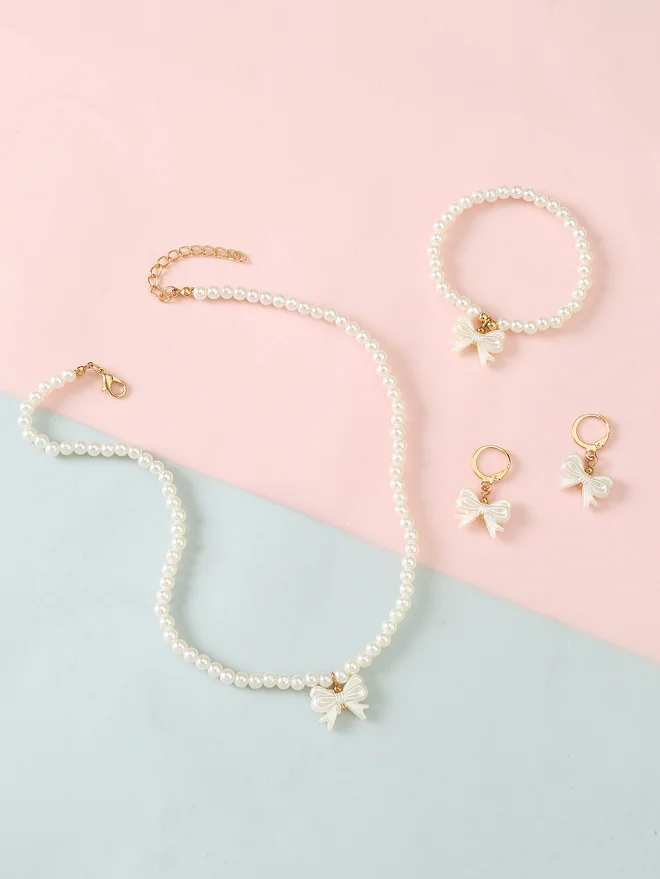 تايك تو Take Two Set of 3 - Bow Pendant Faux Pearl Necklace, Bracelet, and Earring