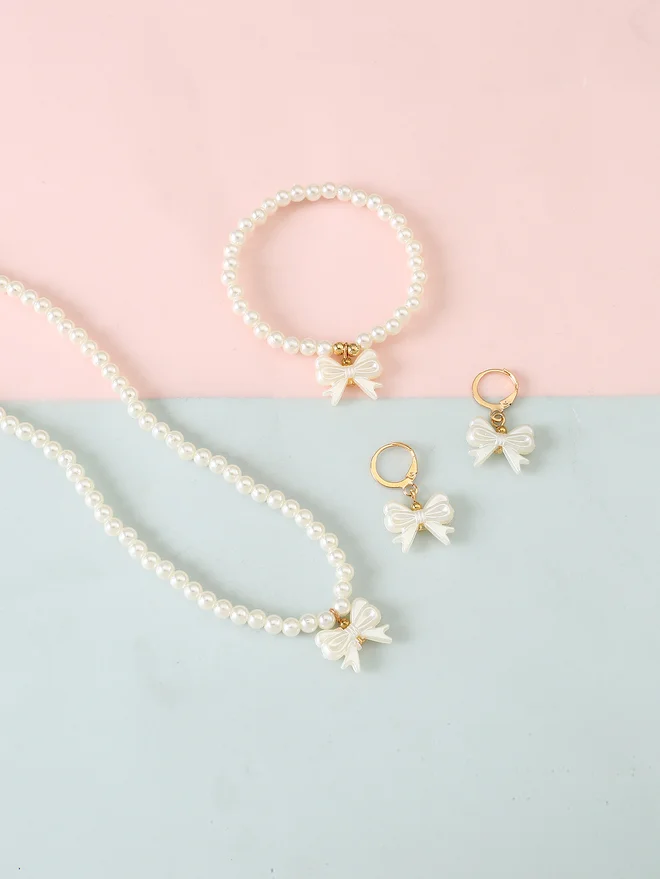 تايك تو Take Two Set of 3 - Bow Pendant Faux Pearl Necklace, Bracelet, and Earring
