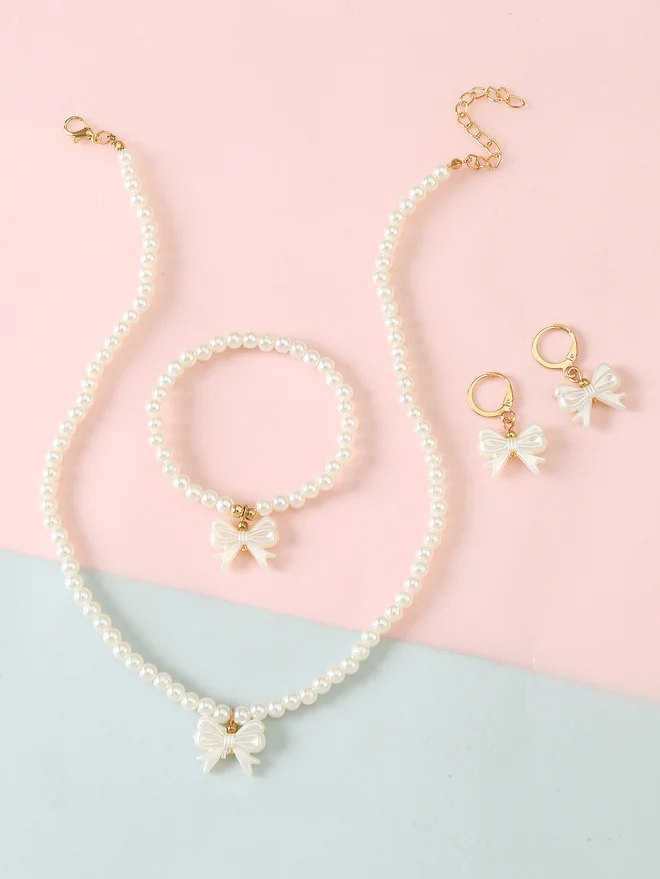 تايك تو Take Two Set of 3 - Bow Pendant Faux Pearl Necklace, Bracelet, and Earring